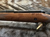 FREE SAFARI, NEW WINCHESTER MODEL 70 SUPER GRADE 300 WIN MAG 26