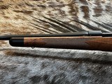 FREE SAFARI, NEW WINCHESTER MODEL 70 SUPER GRADE 300 WIN MAG 26