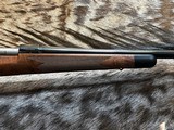 FREE SAFARI, NEW WINCHESTER MODEL 70 SUPER GRADE 300 WIN MAG 26