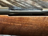 FREE SAFARI, NEW WINCHESTER MODEL 70 SUPER GRADE 300 WIN MAG 26