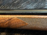 FREE SAFARI, NEW WINCHESTER MODEL 70 SUPER GRADE 300 WIN MAG 26