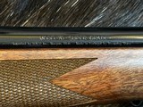 FREE SAFARI, NEW WINCHESTER MODEL 70 SUPER GRADE 300 WIN MAG 26