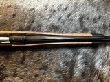 FREE SAFARI, NEW WINCHESTER MODEL 70 SUPER GRADE 300 WIN MAG 26