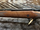 FREE SAFARI, NEW WINCHESTER MODEL 70 SUPER GRADE 300 WIN MAG 26