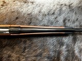 FREE SAFARI, NEW WINCHESTER MODEL 70 SUPER GRADE 300 WIN MAG 26
