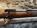 FREE SAFARI, NEW WINCHESTER MODEL 70 SUPER GRADE 300 WIN MAG 26