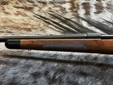 FREE SAFARI, NEW WINCHESTER MODEL 70 SUPER GRADE 300 WIN MAG 26