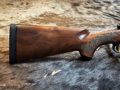 FREE SAFARI, NEW WINCHESTER MODEL 70 SUPER GRADE 300 WIN MAG 26