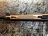 FREE SAFARI, NEW WINCHESTER MODEL 70 SUPER GRADE 300 WIN MAG 26