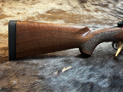 FREE SAFARI, NEW WINCHESTER MODEL 70 SUPER GRADE 300 WIN MAG 26