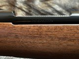 FREE SAFARI, NEW WINCHESTER MODEL 70 SUPER GRADE 300 WIN MAG 26