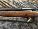 FREE SAFARI, NEW WINCHESTER MODEL 70 SUPER GRADE 300 WIN MAG 26
