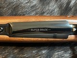 FREE SAFARI, NEW WINCHESTER MODEL 70 SUPER GRADE 300 WIN MAG 26