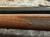 FREE SAFARI, NEW WINCHESTER MODEL 70 SUPER GRADE 300 WIN MAG 26