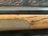 FREE SAFARI, NEW WINCHESTER MODEL 70 SUPER GRADE FRENCH WALNUT 6.5 CREED 22