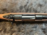 FREE SAFARI, NEW WINCHESTER MODEL 70 SUPER GRADE 338 WIN MAG 26