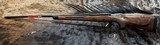 FREE SAFARI, NEW WINCHESTER MODEL 70 SUPER GRADE 338 WIN MAG 26