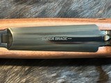 FREE SAFARI, NEW WINCHESTER MODEL 70 SUPER GRADE 338 WIN MAG 26