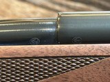 FREE SAFARI, NEW WINCHESTER MODEL 70 SUPER GRADE 338 WIN MAG 26