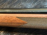FREE SAFARI, NEW WINCHESTER MODEL 70 SUPER GRADE 338 WIN MAG 26