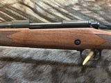 FREE SAFARI, NEW WINCHESTER MODEL 70 SUPER GRADE 338 WIN MAG 26