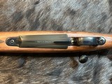 FREE SAFARI, NEW WINCHESTER MODEL 70 SUPER GRADE 338 WIN MAG 26