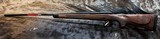 FREE SAFARI, NEW WINCHESTER MODEL 70 SUPER GRADE 338 WIN MAG 26