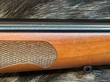 FREE SAFARI, NEW WINCHESTER MODEL 70 FEATHERWEIGHT 264 WIN MAG RIFLE 24