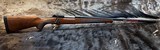 FREE SAFARI, NEW WINCHESTER MODEL 70 FEATHERWEIGHT 264 WIN MAG RIFLE 24