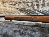 FREE SAFARI, NEW WINCHESTER MODEL 70 FEATHERWEIGHT 264 WIN MAG RIFLE 24
