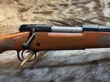 FREE SAFARI, NEW WINCHESTER MODEL 70 FEATHERWEIGHT 264 WIN MAG RIFLE 24