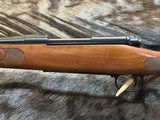 FREE SAFARI, NEW WINCHESTER MODEL 70 FEATHERWEIGHT 264 WIN MAG RIFLE 24