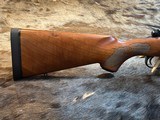FREE SAFARI, NEW WINCHESTER MODEL 70 FEATHERWEIGHT 264 WIN MAG RIFLE 24