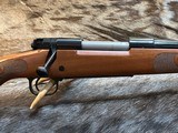 FREE SAFARI, NEW WINCHESTER MODEL 70 FEATHERWEIGHT 264 WIN MAG RIFLE 24
