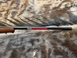 FREE SAFARI, NEW WINCHESTER MODEL 70 FEATHERWEIGHT 264 WIN MAG RIFLE 24
