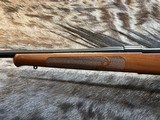 FREE SAFARI, NEW WINCHESTER MODEL 70 FEATHERWEIGHT 264 WIN MAG RIFLE 24