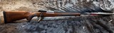 FREE SAFARI, NEW WINCHESTER MODEL 70 FEATHERWEIGHT 264 WIN MAG RIFLE 24