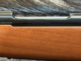 FREE SAFARI, NEW WINCHESTER MODEL 70 FEATHERWEIGHT 264 WIN MAG RIFLE 24