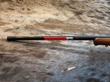 FREE SAFARI, NEW WINCHESTER MODEL 70 FEATHERWEIGHT 264 WIN MAG RIFLE 24