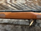 FREE SAFARI, NEW WINCHESTER MODEL 70 FEATHERWEIGHT 264 WIN MAG RIFLE 24