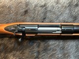 FREE SAFARI, NEW WINCHESTER MODEL 70 FEATHERWEIGHT 264 WIN MAG RIFLE 24