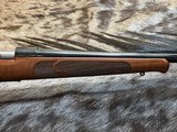 FREE SAFARI, NEW WINCHESTER MODEL 70 FEATHERWEIGHT 264 WIN MAG RIFLE 24