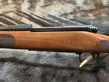 FREE SAFARI, NEW WINCHESTER MODEL 70 FEATHERWEIGHT 264 WIN MAG RIFLE 24
