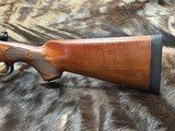 FREE SAFARI, NEW WINCHESTER MODEL 70 FEATHERWEIGHT 264 WIN MAG RIFLE 24