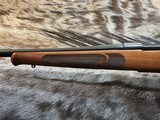 FREE SAFARI, NEW WINCHESTER MODEL 70 FEATHERWEIGHT 264 WIN MAG RIFLE 24