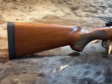 FREE SAFARI, NEW WINCHESTER MODEL 70 FEATHERWEIGHT 264 WIN MAG RIFLE 24