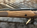 FREE SAFARI, NEW WINCHESTER MODEL 70 SUPER GRADE FRENCH WALNUT 7MM REM MAG 26