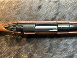 FREE SAFARI, NEW WINCHESTER MODEL 70 SUPER GRADE 300 WIN MAG 26