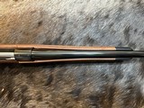 FREE SAFARI, NEW WINCHESTER MODEL 70 SUPER GRADE 300 WIN MAG 26