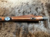FREE SAFARI, NEW WINCHESTER MODEL 70 SUPER GRADE 300 WIN MAG 26